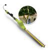 Sun Joe electric telescoping pole hedge trimmer with inest image of product in use